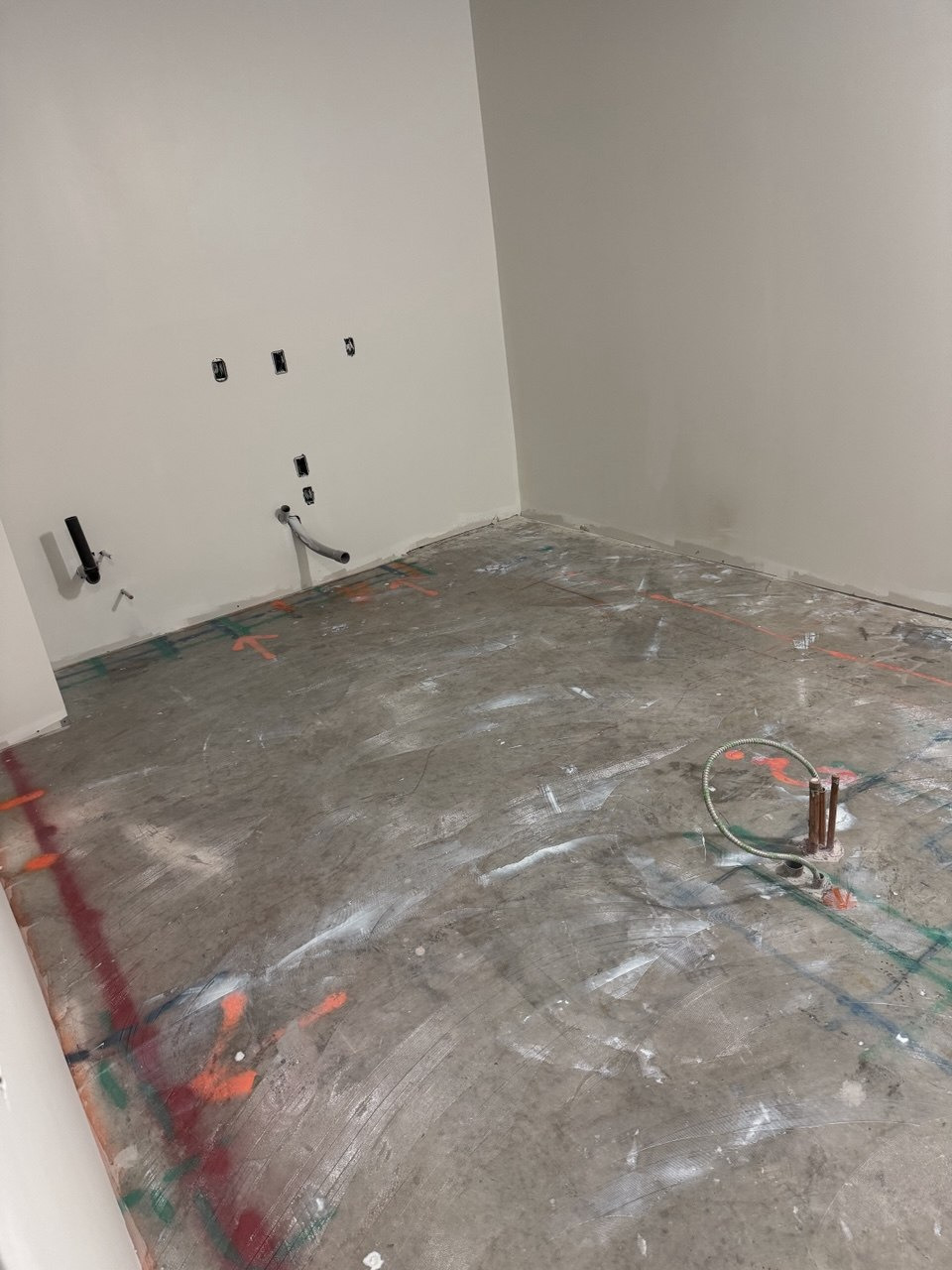 Glue-down vinyl flooring installation in a dental office treatment and reception area (view 3)