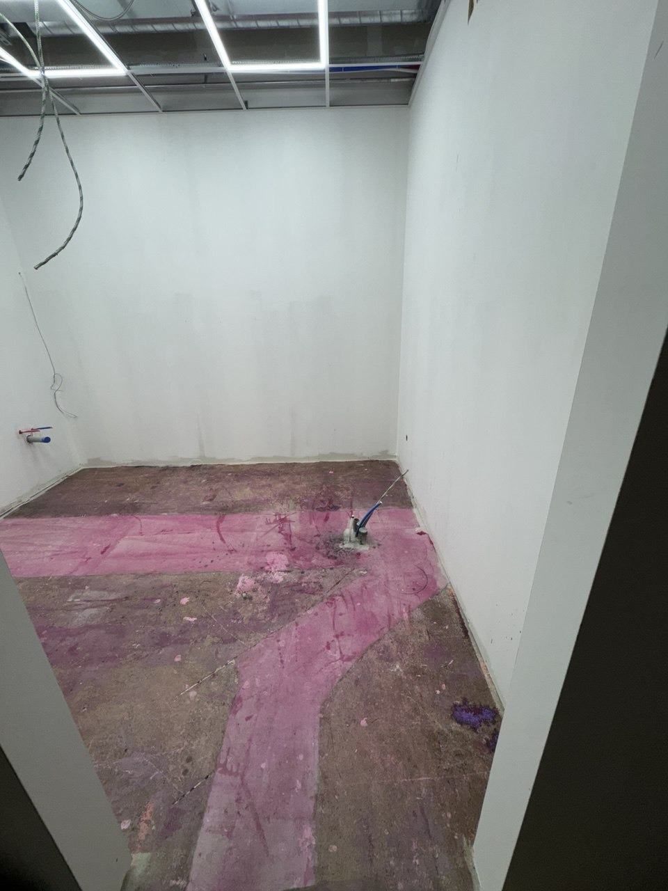 Floor leveling compound applied to an uneven subfloor to create a flat surface ready for finish flooring (view 2)