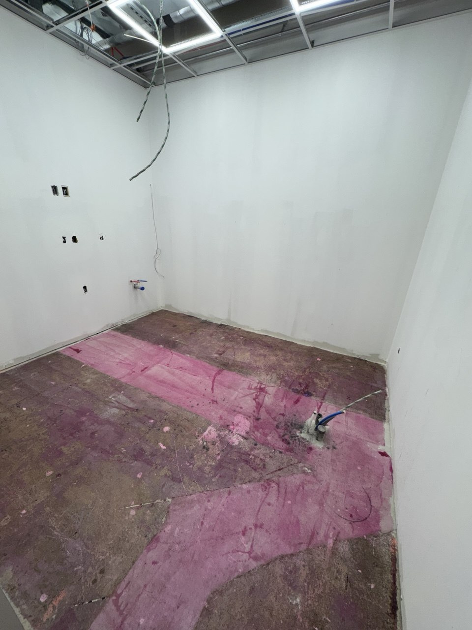 Floor leveling compound applied to an uneven subfloor to create a flat surface ready for finish flooring (view 3)